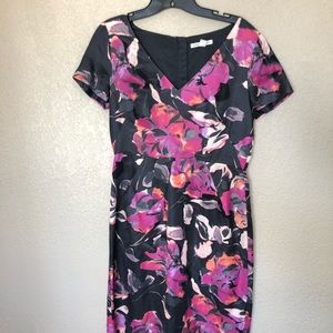 Fitted black dress with pink flowers